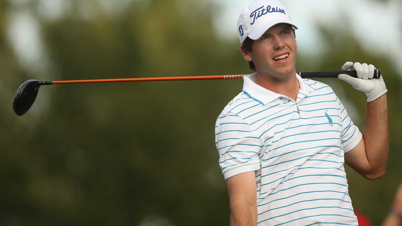 Ben Martin plays his tee shot on the 16th