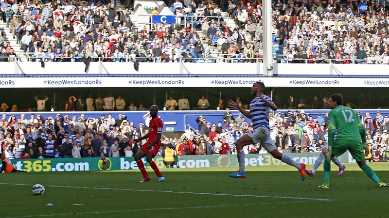 QPR'S Steven Caulker reacts in horror after his interception diverts the ball goalwards