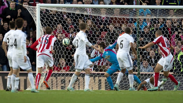 Jonathan Walters (far right) watches his header hit the back of the Swansea net