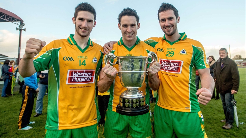 Brothers Martin, Michael and James Farragher celebrates Corofin's win over St Michael's in Tuam