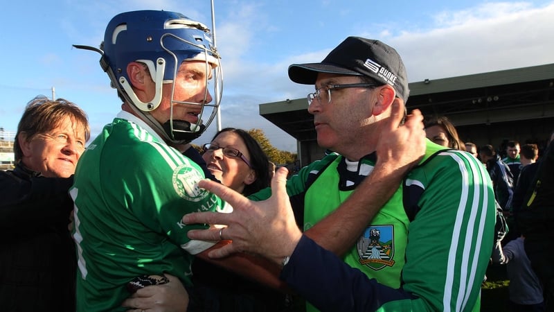 Gavin O'Mahony celebrates with Ger O'Loughlin after Kilmallock's win over Na Piarsaigh