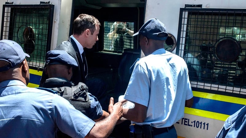 Oscar Pistorius is led away to Pretoria's Kgosi Mampuru prison