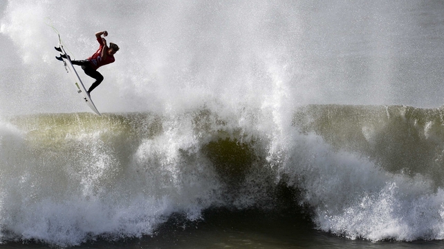 Hang time for Hawaian surfer John John Florence during the Moche Rip Curl Pro Portugal at Supertubos Beach in Peniche
