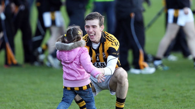 Paul Hughes of Crossmaglen celebrates with his niece Eva Rose at the end of the Armagh SFC final