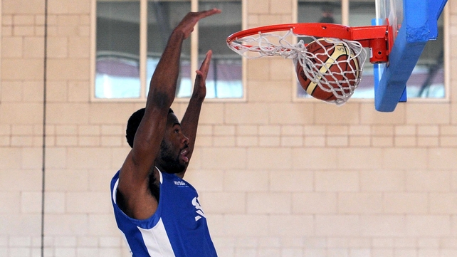 Belfast Star's Ricky Taylor dunks during his side's Premier League clash with UCC Demons