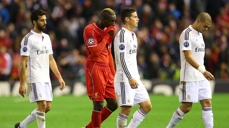 Mario Balotelli follows Pepe off the pitch at half-time at Anfield