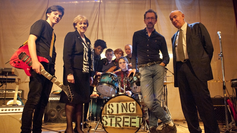 Minister Humphreys on the Sing Street set with director John Carney, star Ferdia Walsh-Peelo and Bord Scannán na hÉireann/Irish Film Board Chief Executive James Hickey