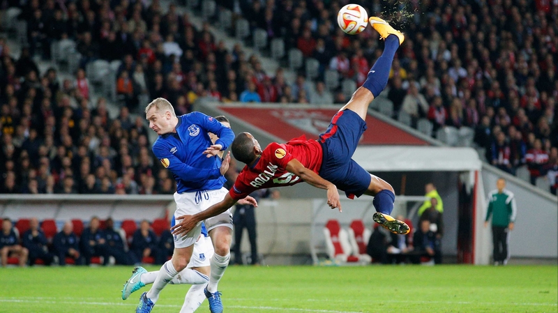 Lille's Ronny Rodelin attempts the spectacular with Tony Hibbert challenging