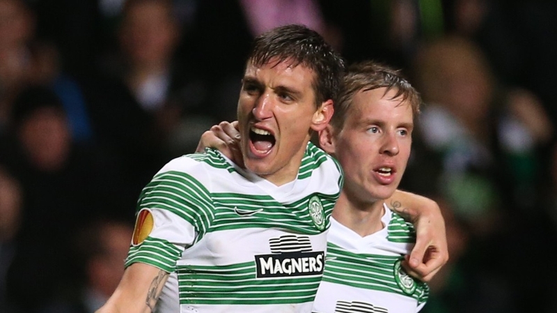 Celtic's Serbian striker Stefan Scepovic (L) celebrates putting Celtic in front against Astra Giurgiu