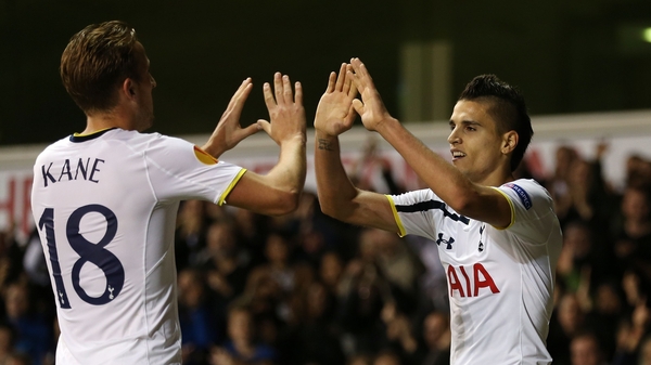 Tottenham goalscorers Erik Lamela (R) and Harry Kane congratulate each other