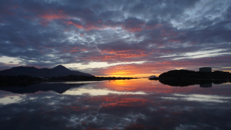 The sun sets over Westport Harbour in Co Mayo, with Croagh Patrick visible in the background (Pic: Erica Gunnigle)