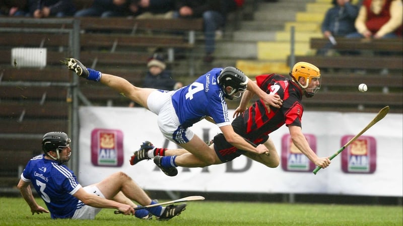 Ballygunnar’s Brian O'Sullivan goes down under a challenge from David Ryan