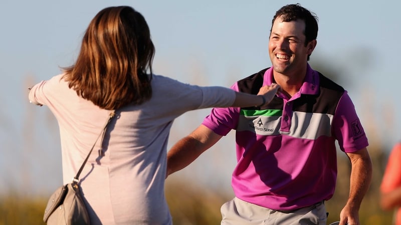 Robert Streb's wife Maggie rushes to congratulate him