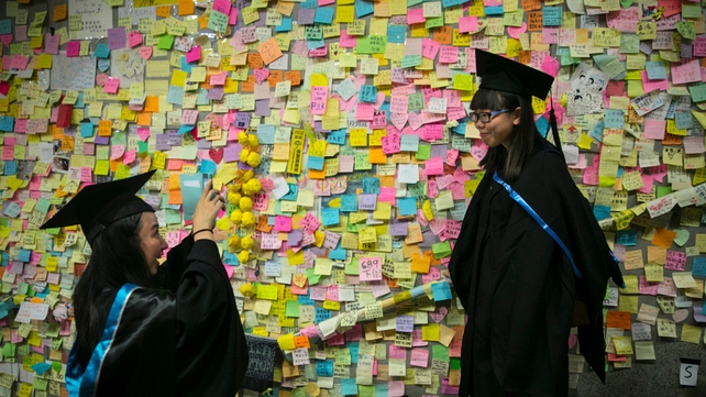 Hong Kong's graduates pose for photos