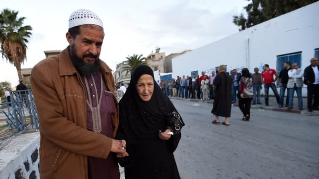 Tunisians vote in democratic elections