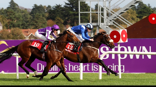 Zawraq ridden by champion jockey Pat Smullen (right) comes home to win the European Breeders Fund Maiden at Leopardstown