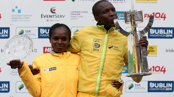 Men's winner Eliud Too with women's winner Esther Wanjiru Macharia