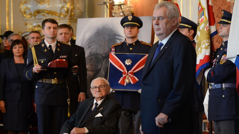 Sir Nicholas Winton sat opposite seven of the children he had rescued