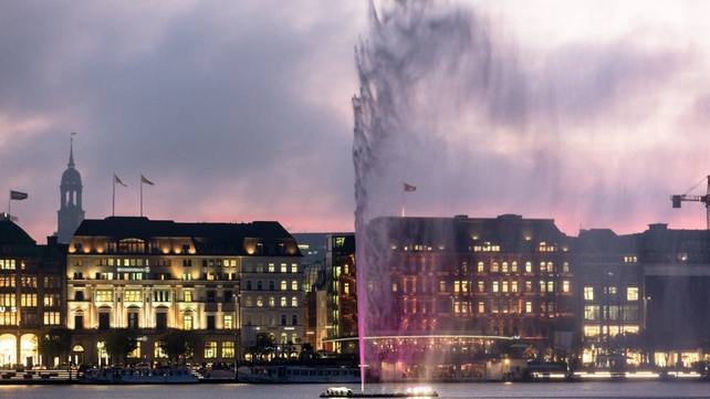The Alster Fountain is lit up pink to raise awareness for Breast Cancer in Hamburg, Germany