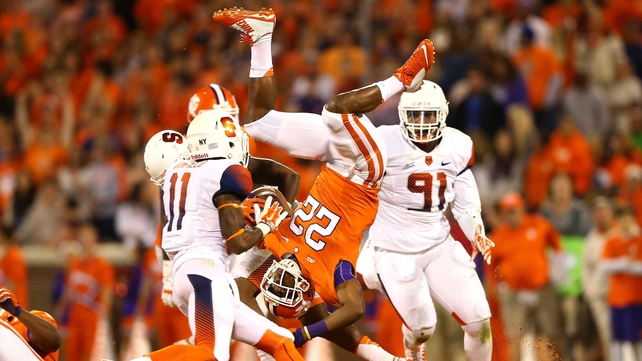 DJ Howard of the Clemson Tigers goes head over heels against the Syracuse Orange in South Carolina