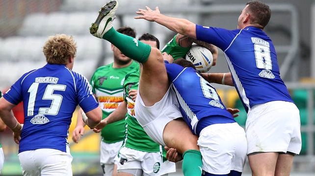 Ireland's Sean Hesketh is tackled by Danny Brough of Scotland at Tallaght Stadium