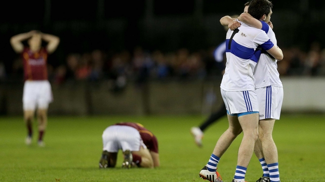 The agony and the ecstasy - St Vincent's players Kevin Bonnie and Mick Concarr celebrate after winning the Dublin SFC final