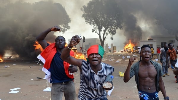 Protesters are demanding that the president stands down when his term ends