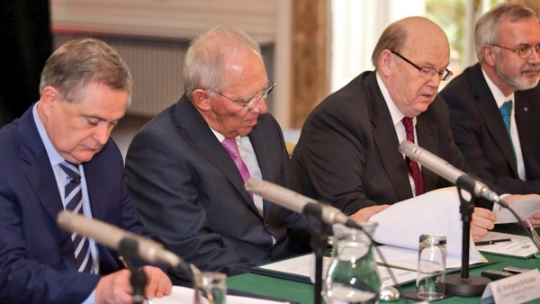 Brendan Howlin, Wolfgang Schaeuble, Michael Noonan and Werner Hoyer sign the bill (Pic: Merrion Street)