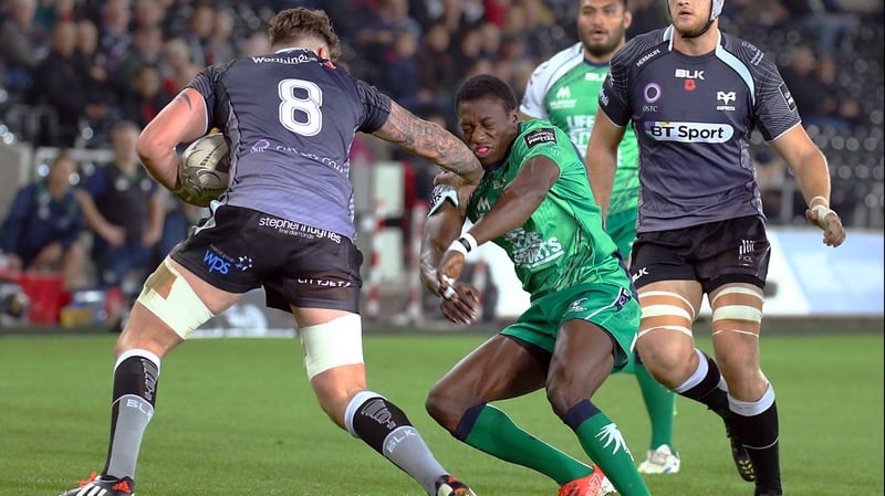 Ieuan Jones of Ospreys hands off Connacht's Niyi Adeolokun in a one-sided affair at the Liberty Stadium