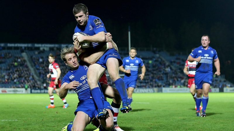 Leinster's Luke McGrath and Luke Fitzgerald with Dougie Fife of Edinburgh