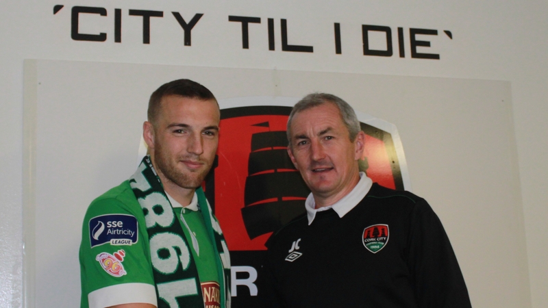 Karl Sheppard and John Caulfield after the player completed his signing