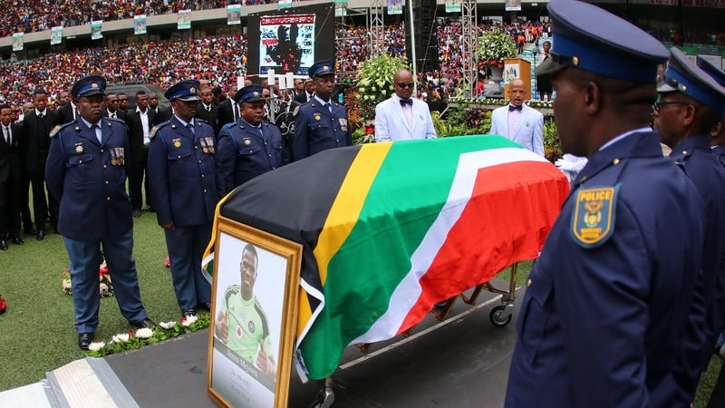 Senzo Meyiwa's coffin draped in the South African flag at the funeral service at Moses Mabhida Stadium in Durban