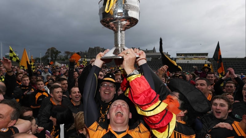 Austin Stacks' Darragh Long celebrates with the cup