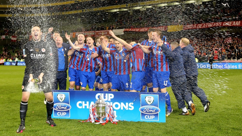 St Pat's players celebrate as the Inchicore club lifted the Cup for the first time in 53 years