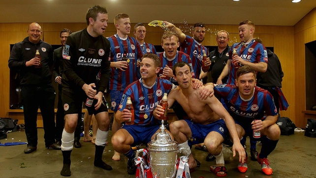 Pat's players celebrate in the dressing room after the game
