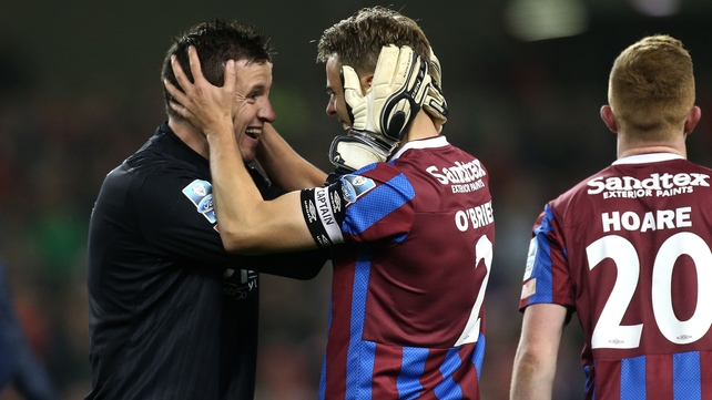 Skipper and keeper Ger O'Brien and Brendan Clarke celebrate after the game