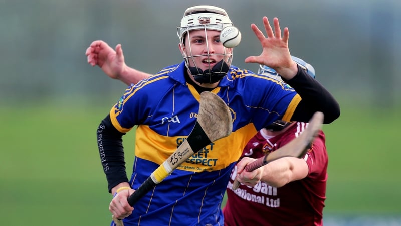 Portaferry's Eoghan Sands in action against Cushendall's Paddy McNaughton