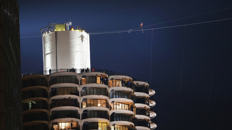 Nik Wallenda begins the walk above Chicago