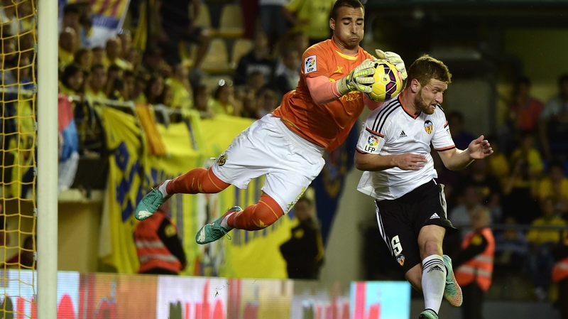 Centre-back Shkodran Mustafi (r) scored twice for Valencia