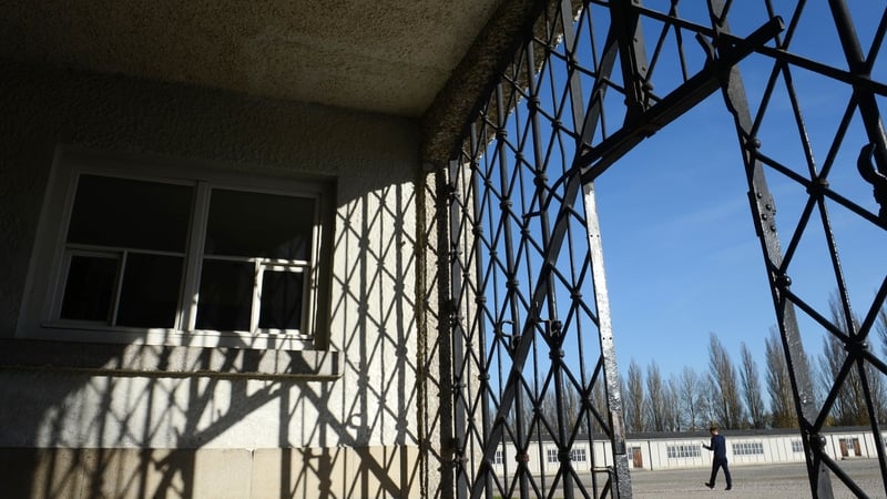 The entrance gate without the door of the former concentration camp in Dachau
