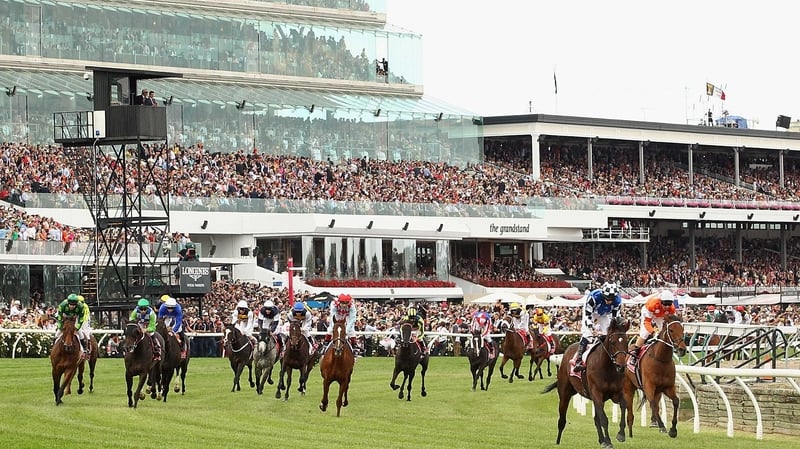 Ryan Moore (2r) riding Protectionist crosses the line to win the Melbourne Cup