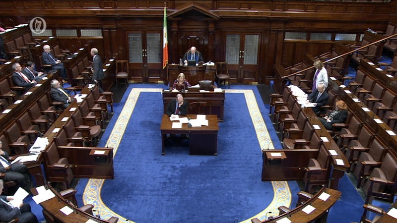 Joan Burton told the Dáil she believed a family of two parents with two young adults will pay less than €200
