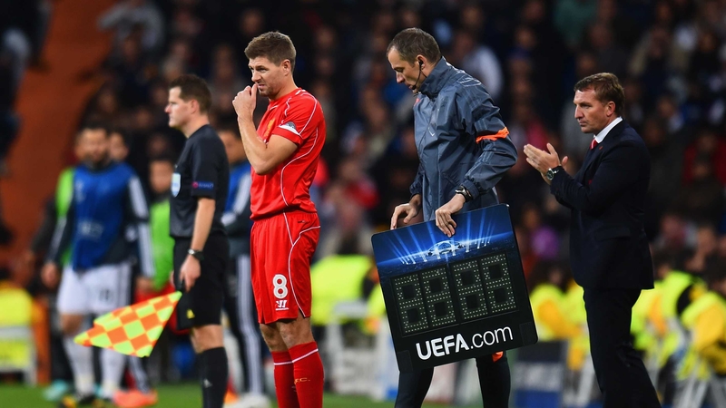 Brendan Rodgers looks on as Steven Gerrard prepares to come on during the game against Real Madrid
