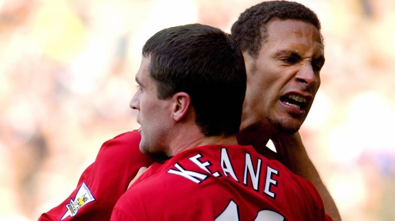 Former Manchester United team-mates' Rio Ferdinand (R) and Roy Keane celebrate in 2003