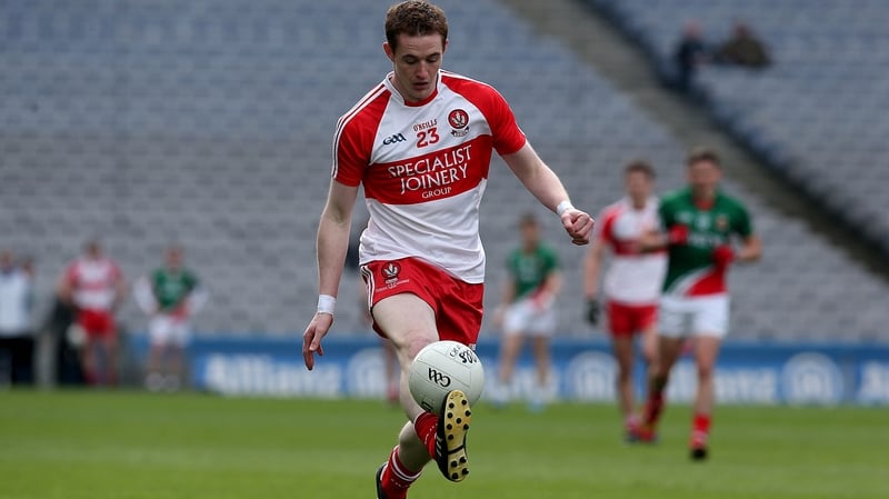 Aaron Devlin in action for Derry during the 2014 Allianz Football League semi-final against Mayo