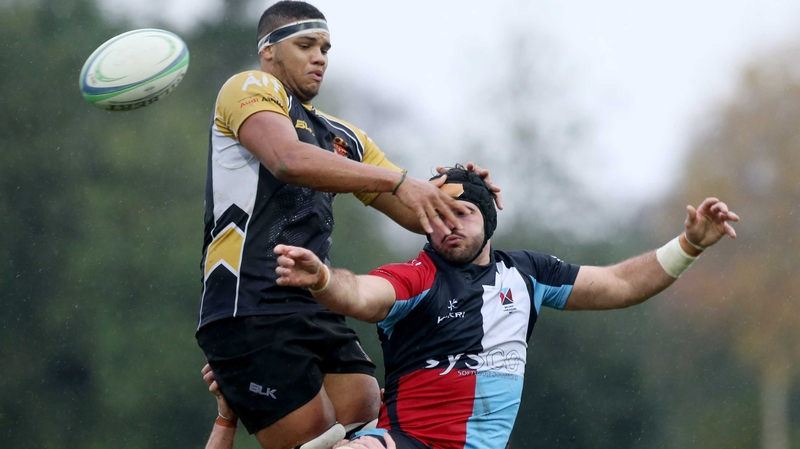 Quins Frank Taggert in action with Buccaneers Cian Romaine