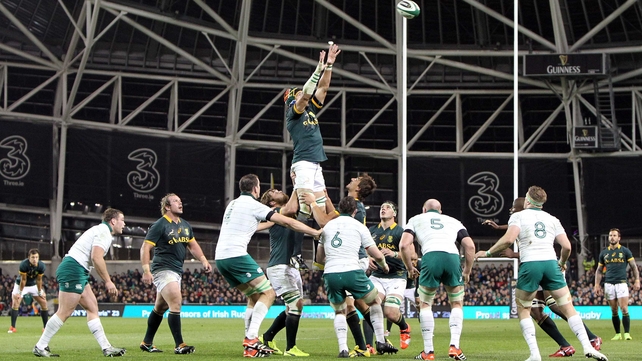 South Africa's Victor Matfield soars high in the night sky to win a line-out - an area the Boks dominated