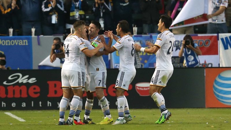 Robbie Keane receives the congratulations of his LA Galaxy team-mates in Carson