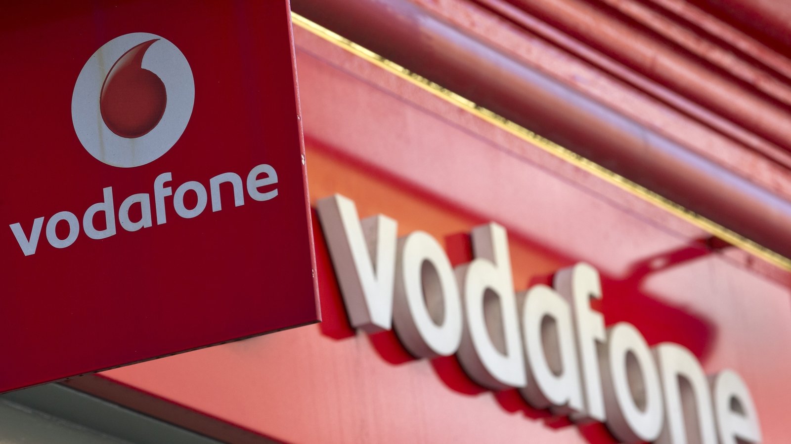 Vodafone to lift dividend for first time in eight years