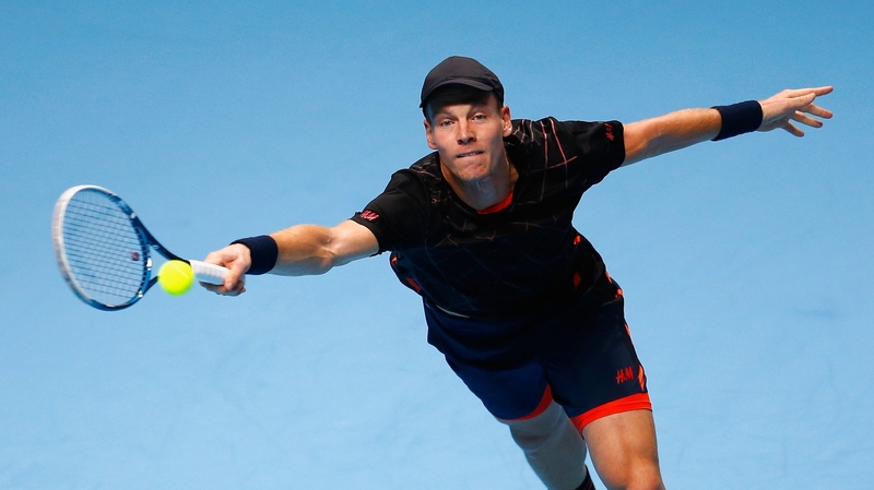 Tomas Berdych of Czech Republic plays a forehand against Marin Cilic of Croatia